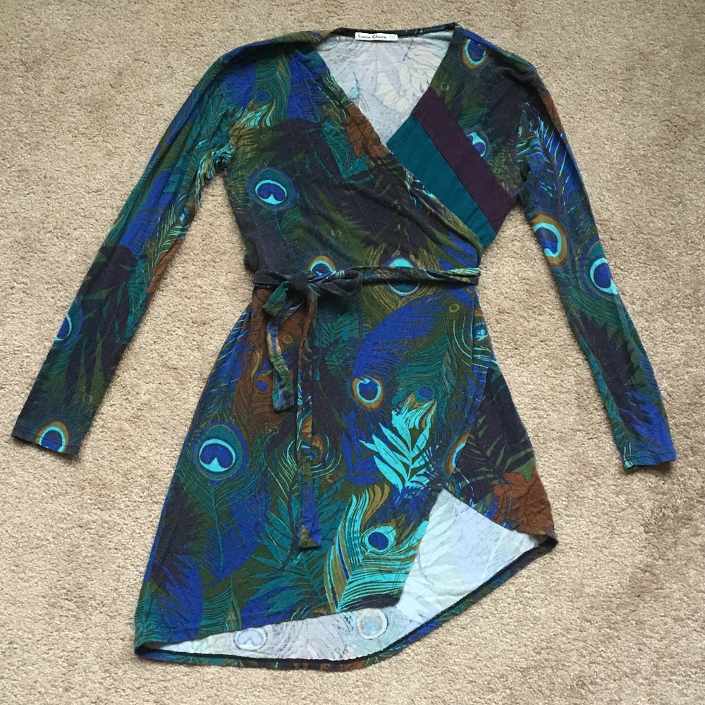 Asymmetrical wrap tunic with peacock print